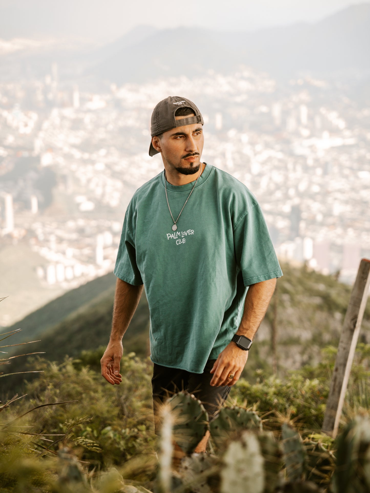 CROSSED PALM TREES TEE - JUNGLE GREEN